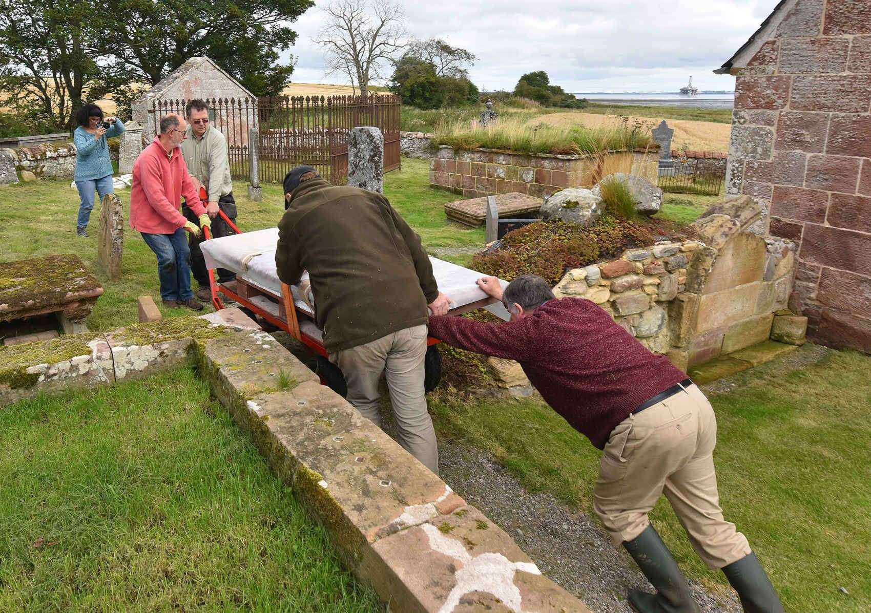 Removal of the stone and its ultimate replacement represented a significant effort for volunteers determined to show respect to the woman who wished to honour her parents.