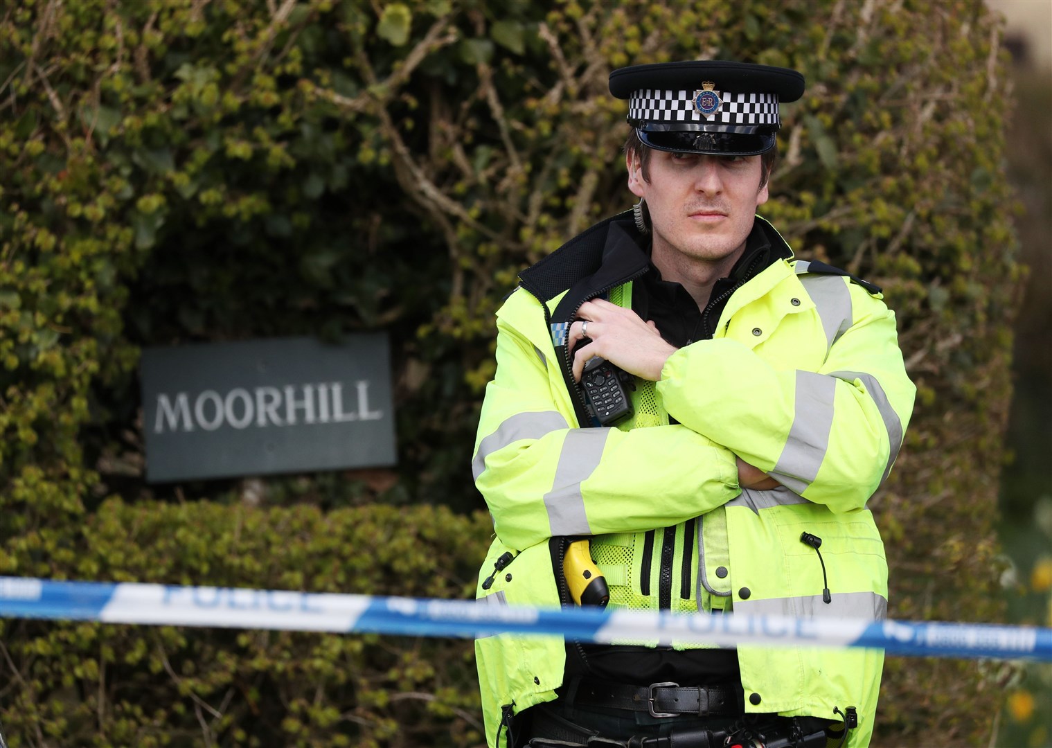 A police officer mans a cordon at the junction of Moor Lane and Langham Lane in Gillingham, Dorset, following the death of Sir Richard Sutton (Jonathan Brady/PA Images)