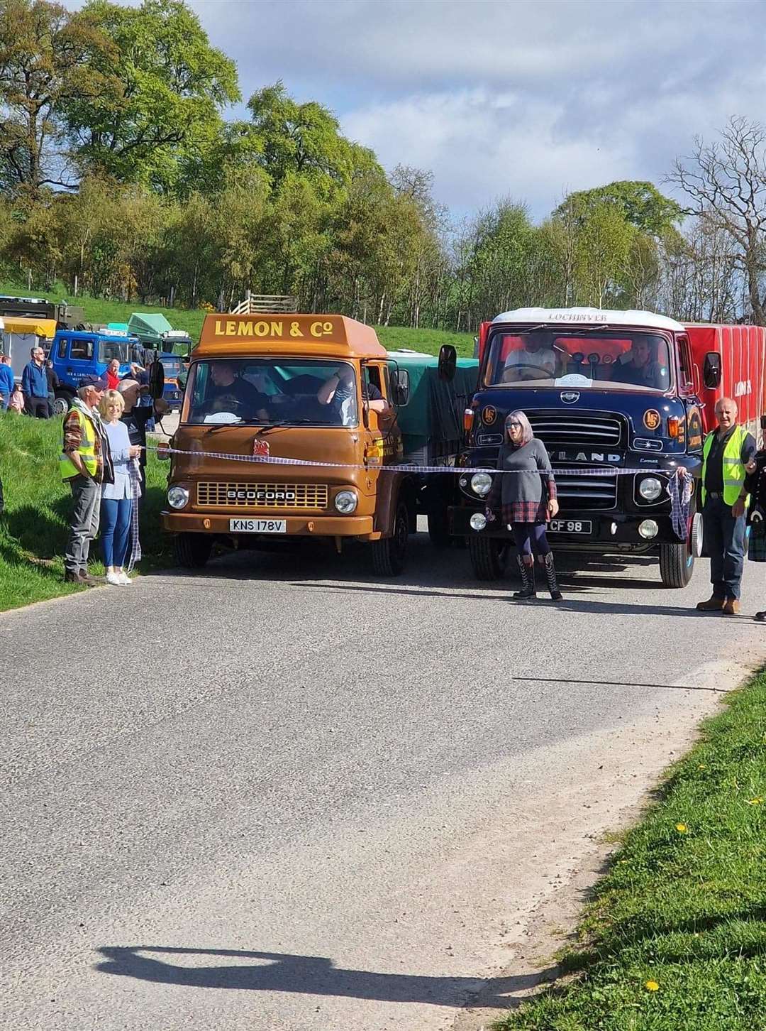 The Bedford Lemon and Co lorry was driven by Ewen Ross (Contin). The second Lochinver fish Leyland was driven by Jimmy Peat of Lochinver. Julie Board of Embo cut the ribbon. Colin Innes was the piper.