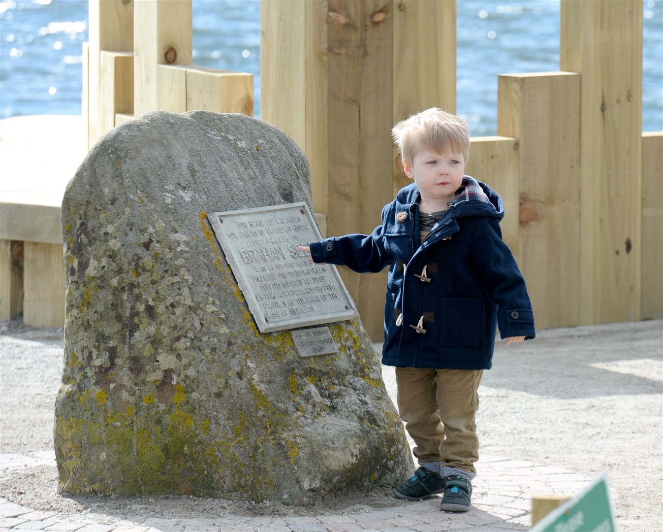 Max Brockie is drawn to the Brahan Seer stone at Chanonry. Picture: Gary Anthony.