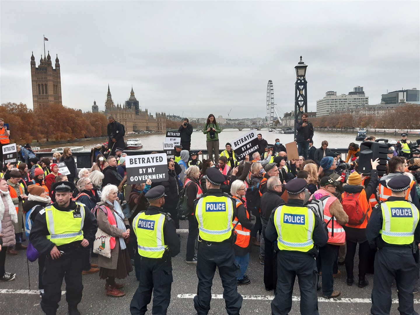 Supporters of jailed Insulate Britain climate activists demonstrate on Lambeth Bridge in central London (Helen William/PA)