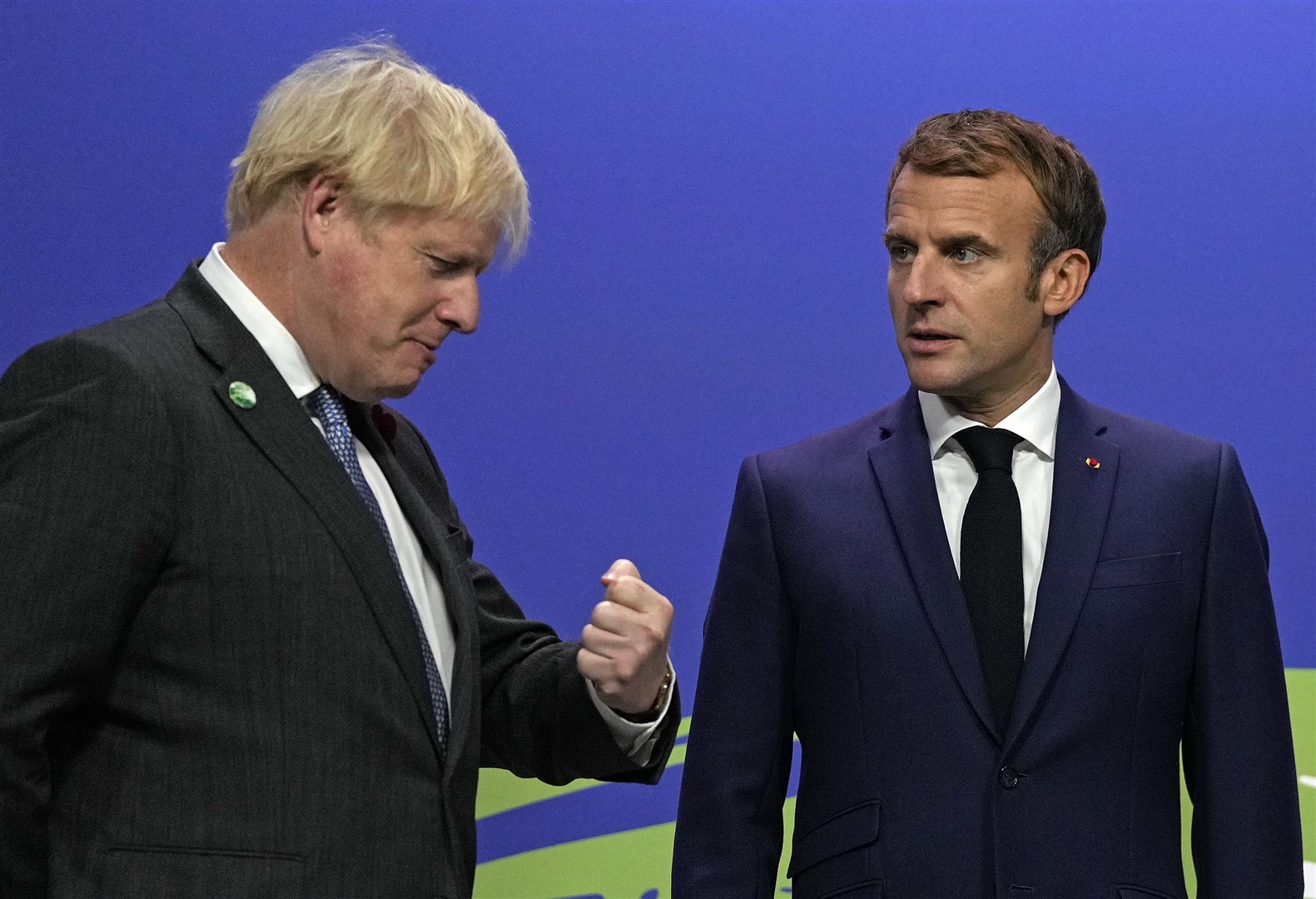 President Emmanuel Macron (right) said Boris Johnson’s proposals were ‘not serious’ (Alastair Grant/PA)