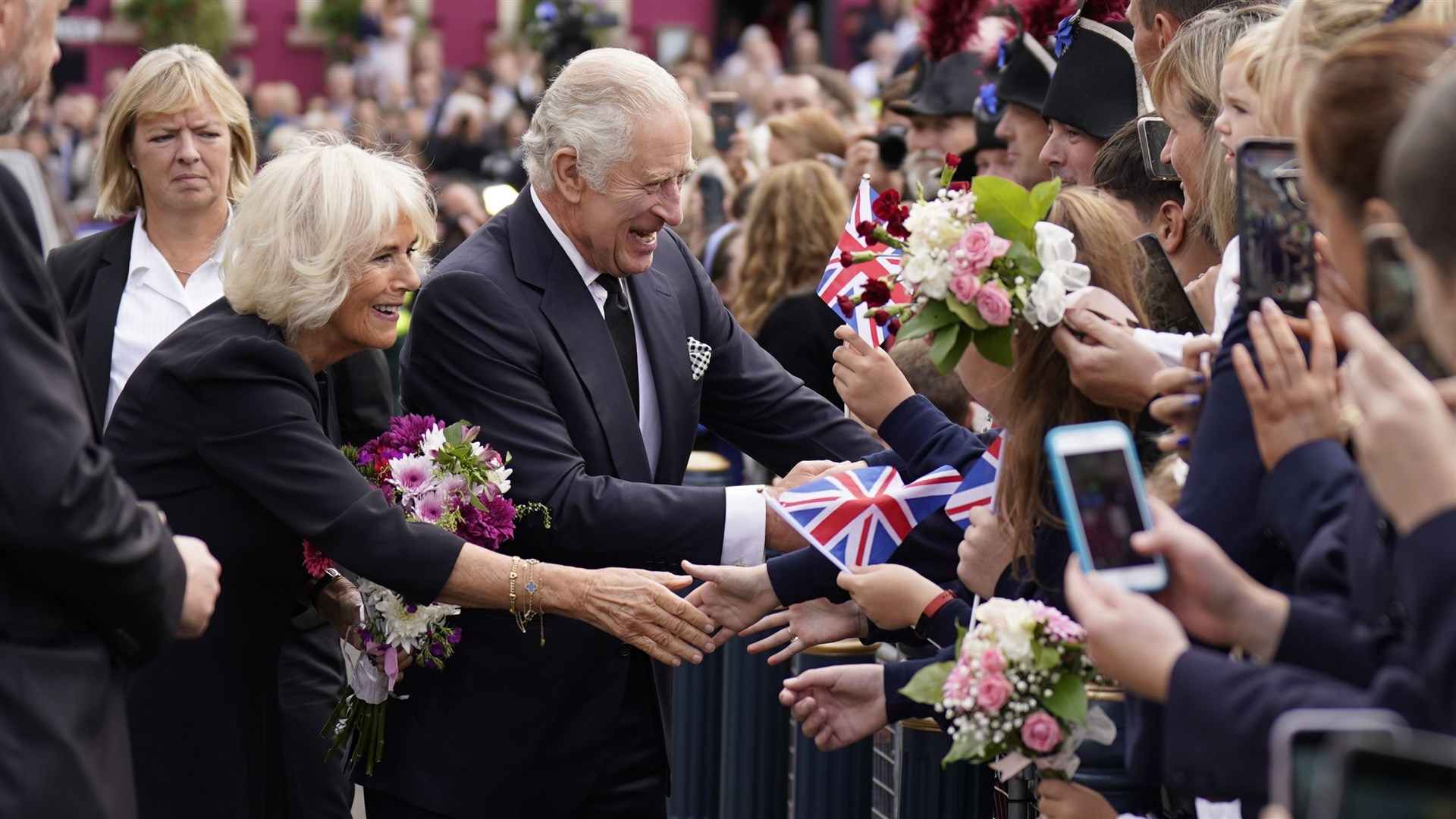 The King spoke with well-wishers as he arrived (Niall Carson/PA)