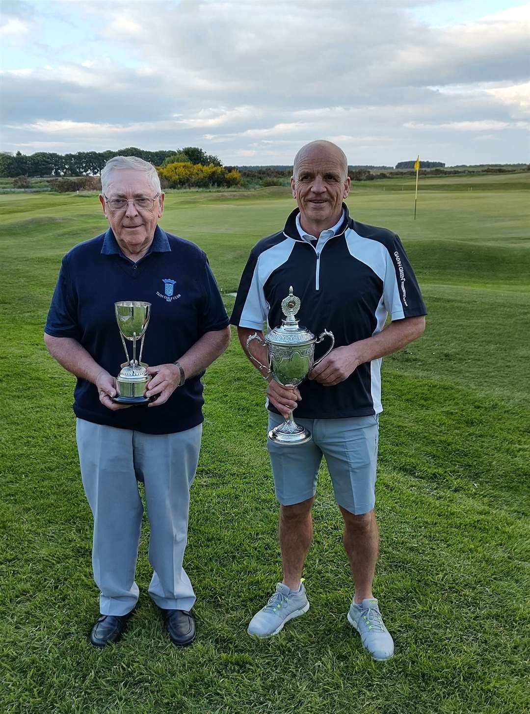 John Cameron and Billy Ferries with their trophies after winning their respective sections at the Tain championships.