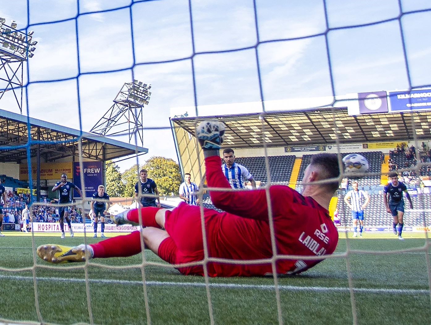 Picture - Jeff Holmes. Ross County 'keeper Ross Laidlaw saves penalty-kick from Kilmarnock's Daniel Armstrong.