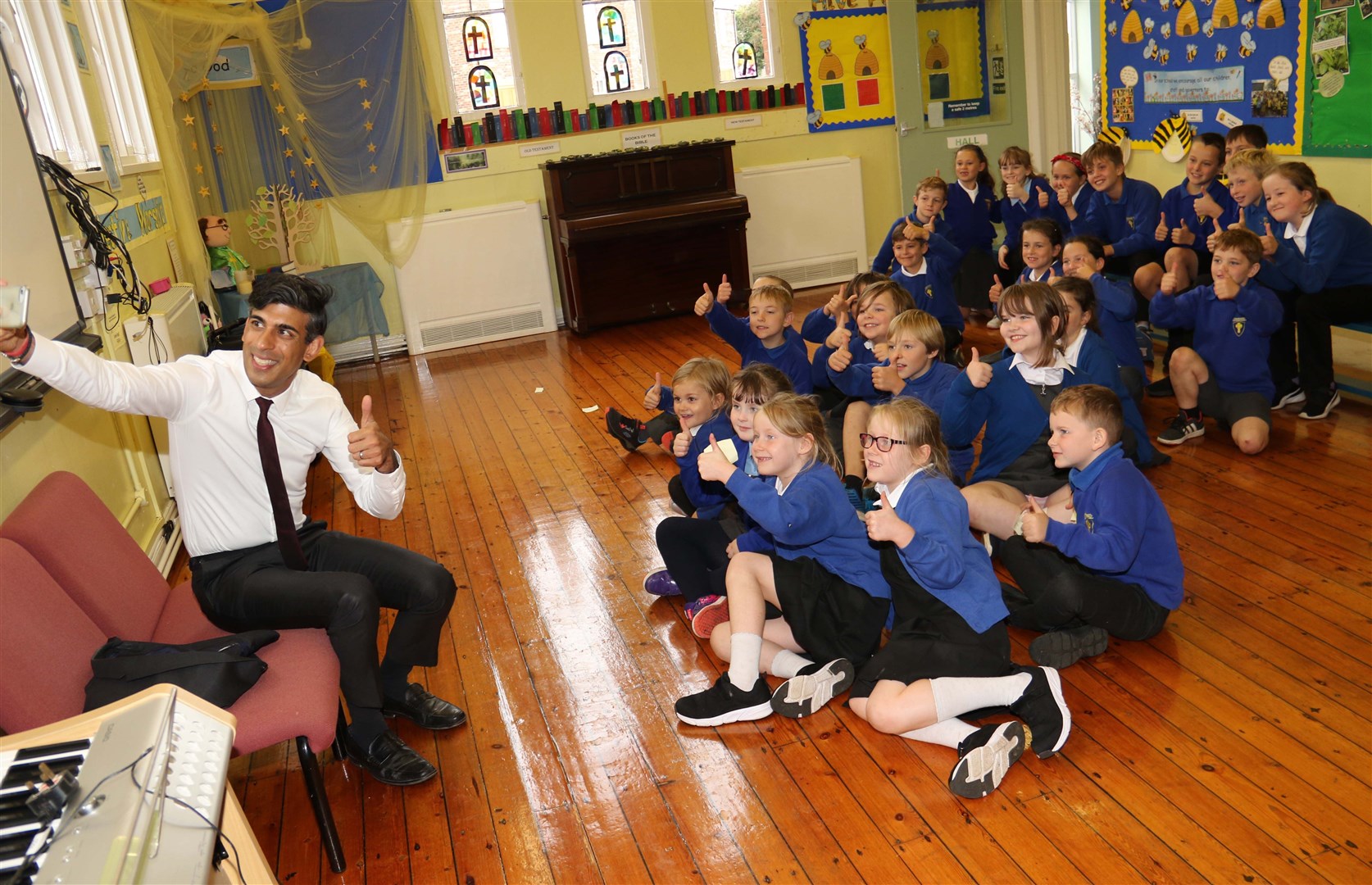 The Chancellor took a selfie with pupils at the village school (Ian Lamming/PA)