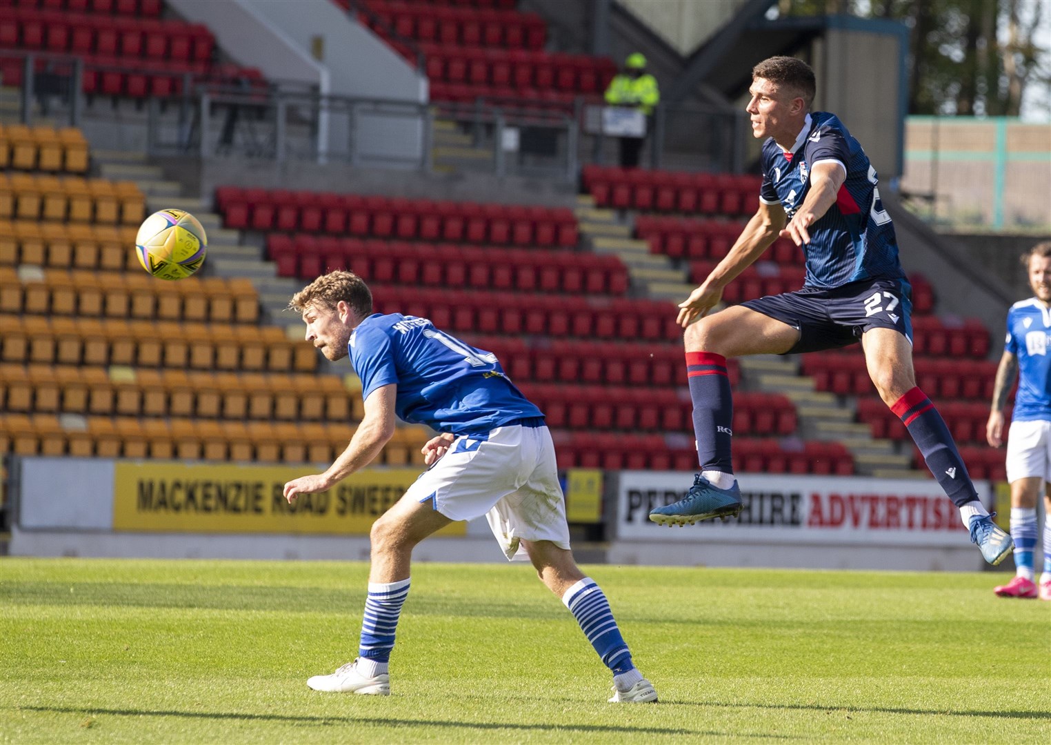 Ross County's Ross Stewart gets a shot on goal past St Johnstone's David Wotherspoon last weekend. Picture: Ken Macpherson