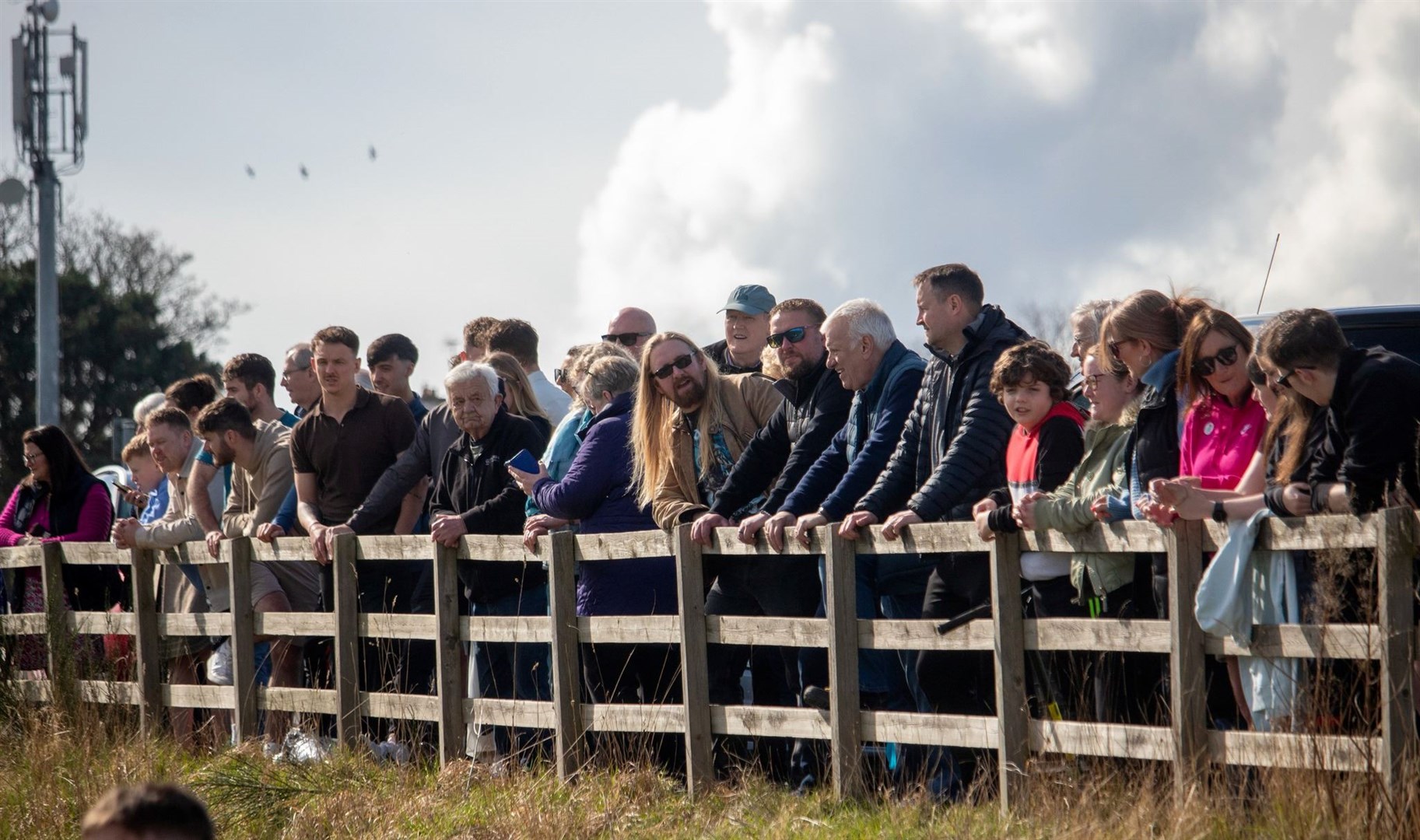 A healthy crowd came down to the Links in Tain to watch the game. Picture: Niall Harkiss