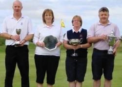 The winners from the Tain club championships show off their trophies.