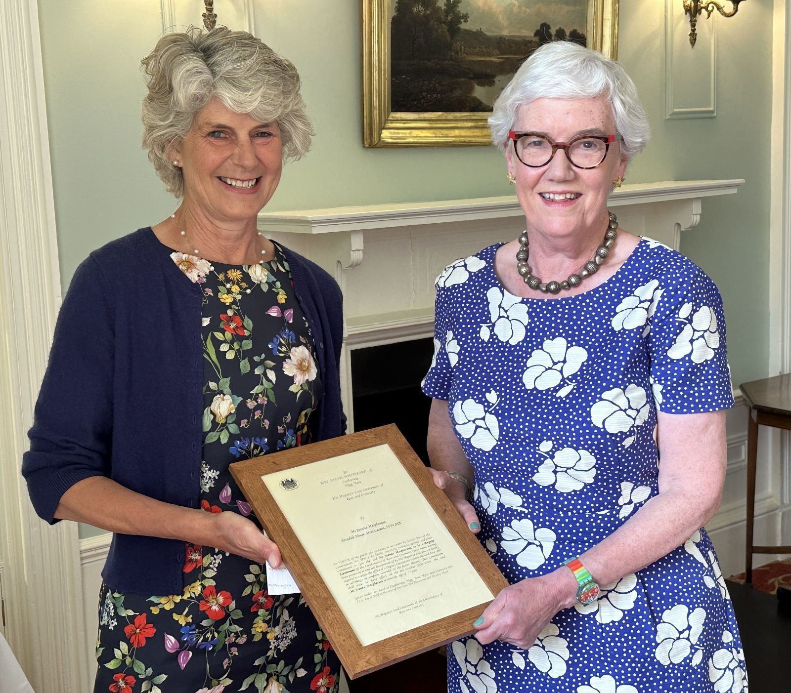 Lord Lieutenant Joanie Whiteford presents Joanna Macpherson with her commission.