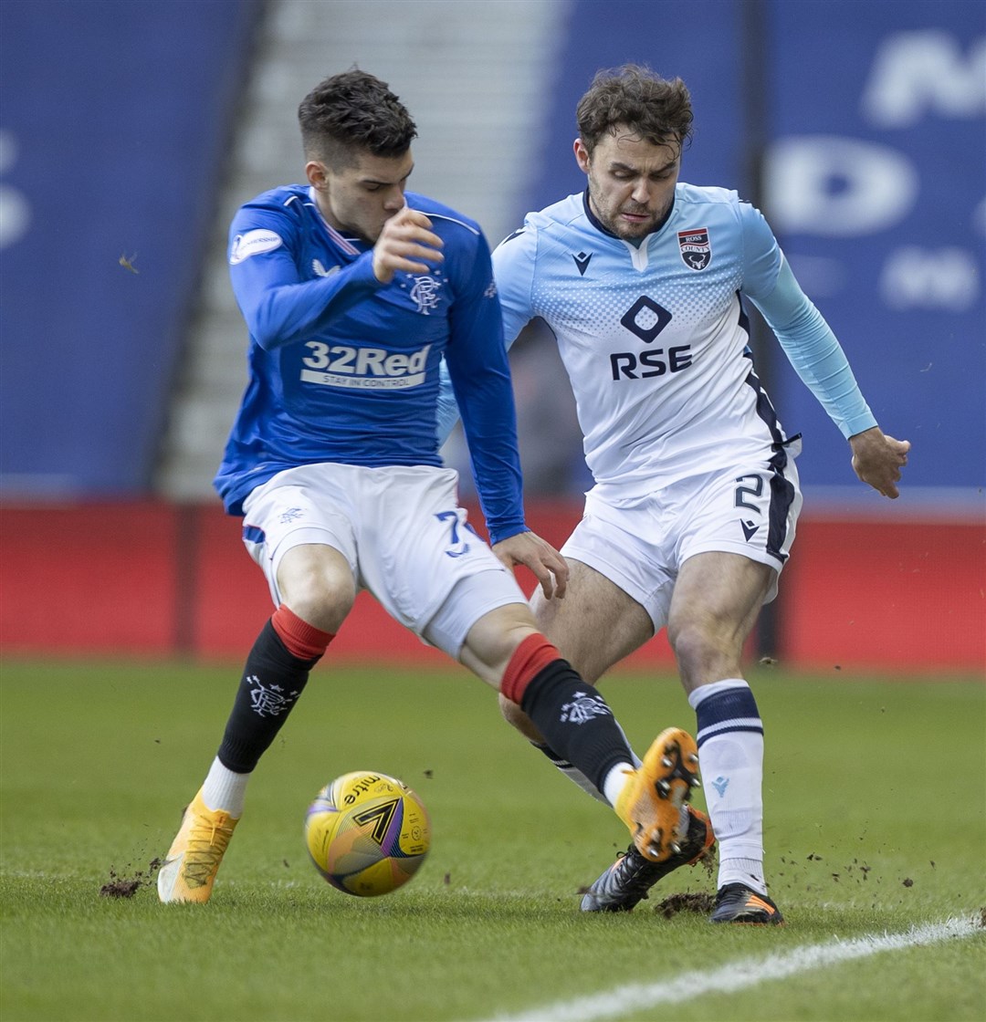 Connor Randall was withdrawn early in the second half against Rangers after his back injury flared up again. Pictures: Ken Macpherson