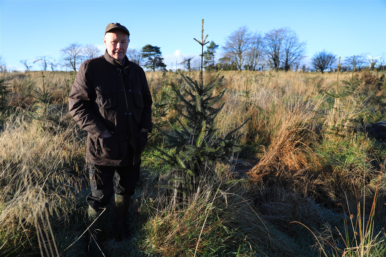 Stewart Hood on his land near Antrim (Peter Morrison/PA)