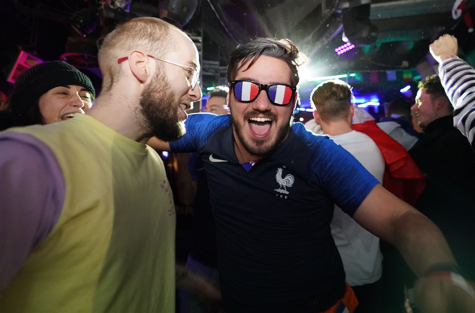 France fans celebrate at the Zoo Bar & Club in London (James Manning/PA)