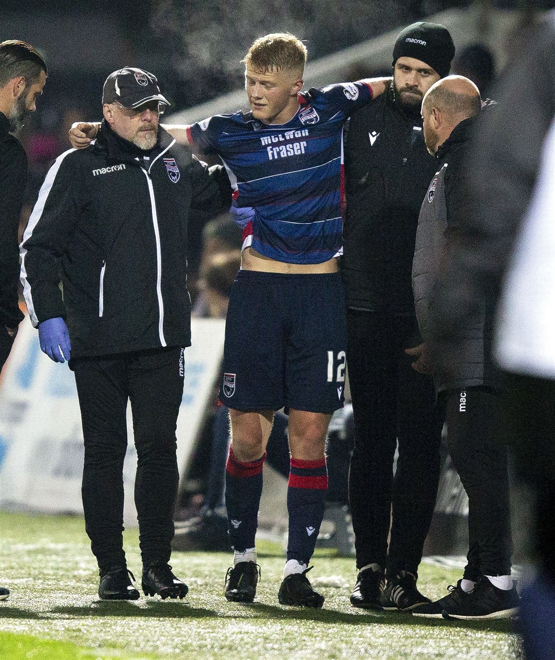 Picture - Ken Macpherson, Inverness. Ross County(0) v Rangers(4). 30.10.19. Ross County's Tom Grivosti had to be taken off injured..