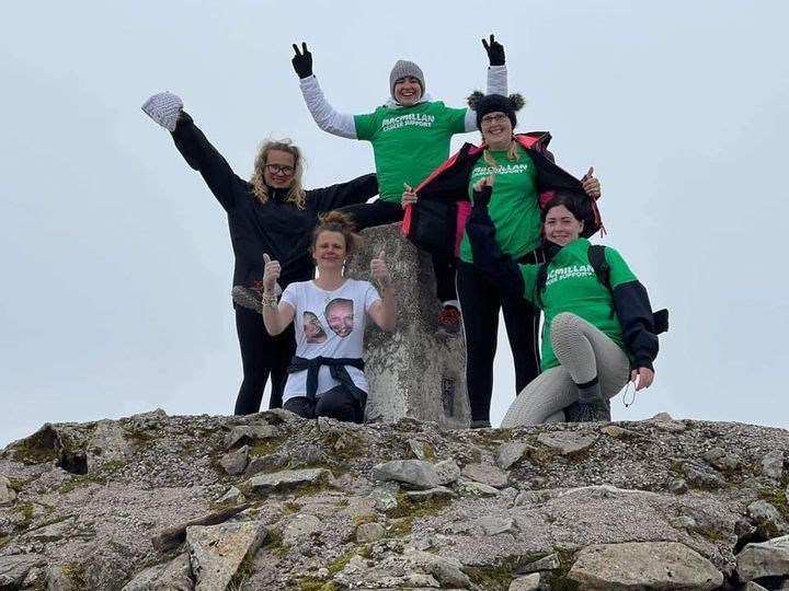 Colleagues climb Ben Nevis for Macmillan cancer support chairty.