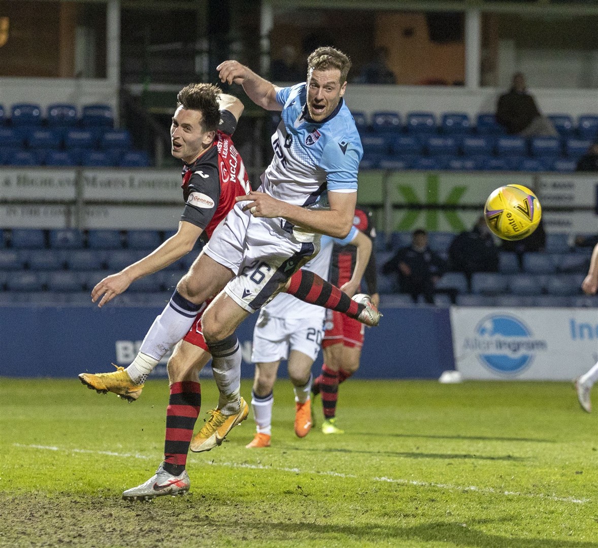 Picture - Ken Macpherson, Inverness. Ross County(1) v St.Mirren(3). 21.04.21. Ross County's Jordan White sees the ball headed clear past him by St.Mirren's Conor McCarthy.