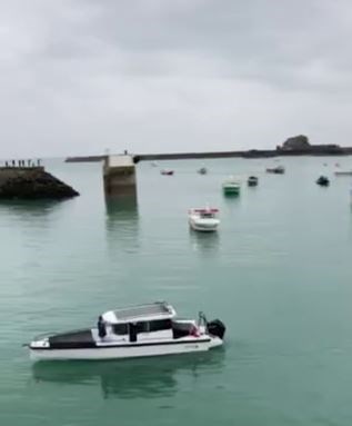 Screengrab from video showing French fishing vessels staging a protest outside the harbour at St Helier (Alex Ferguson/PA)