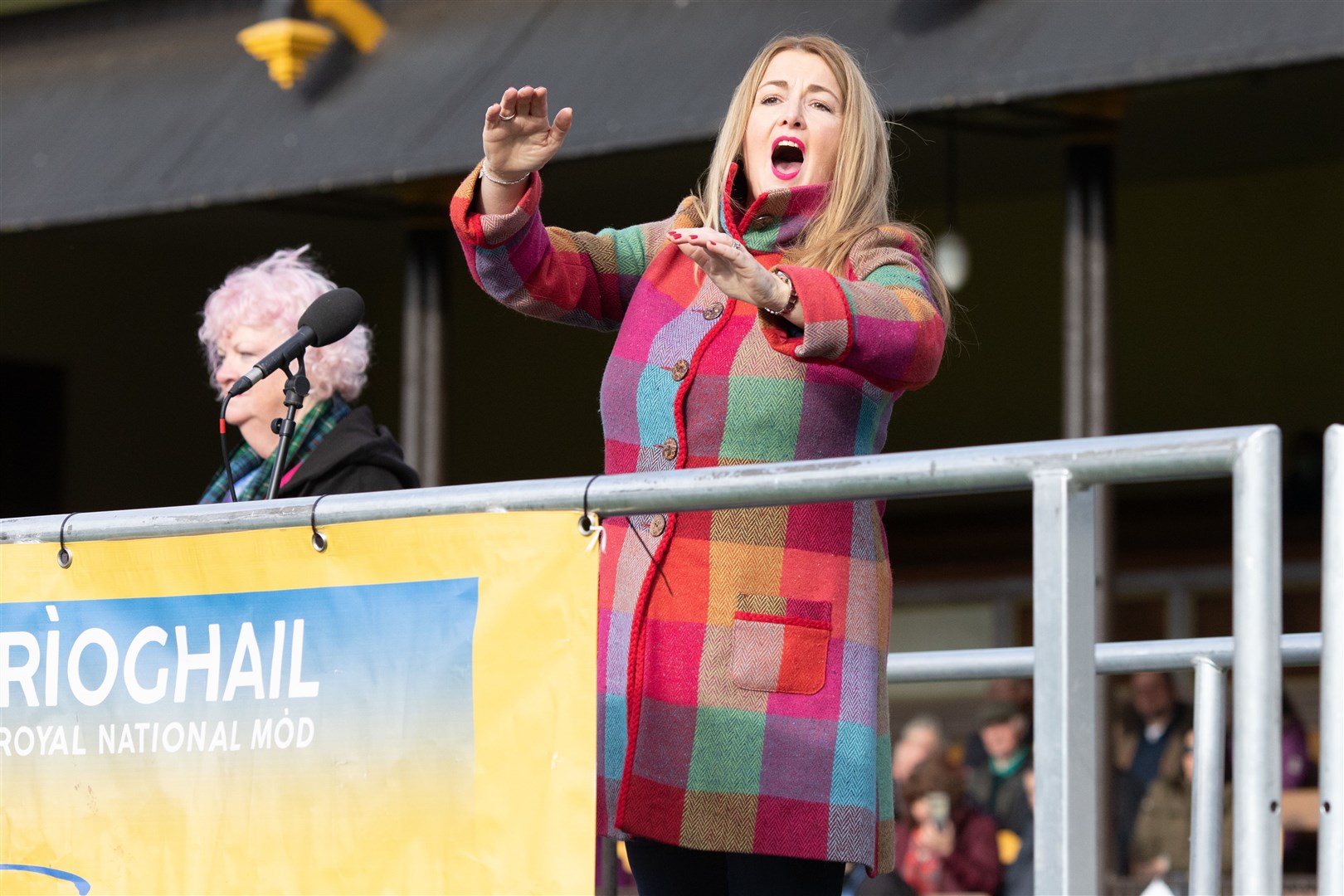Kirsteen Menzies from the Black Isle Gaelic Choir conducting at the Massed Choirs Event at The Northern Meeting Park in Inverness.