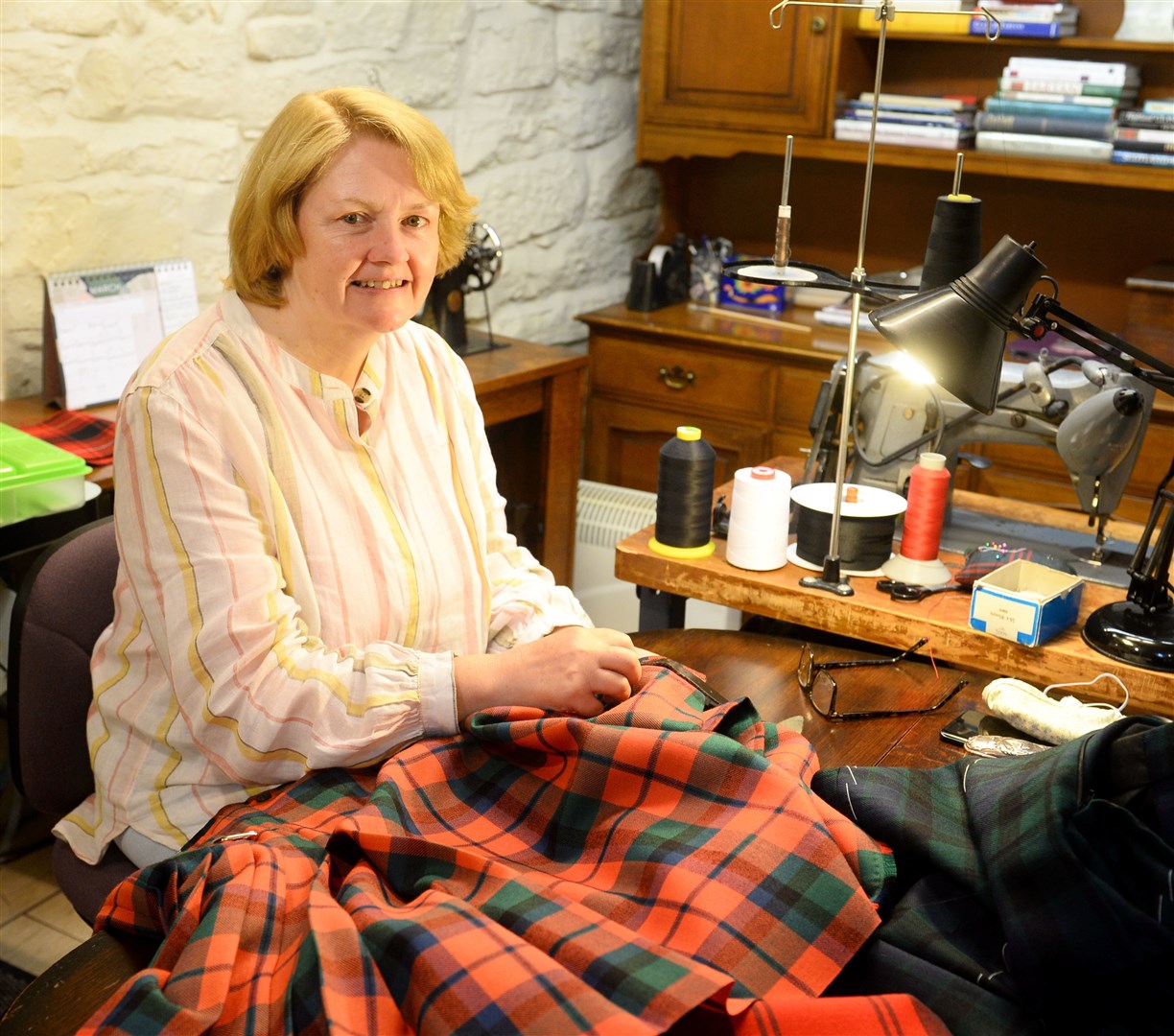 Irene Cathcart, who runs True Kiltmakers, made hundreds of masks on her own time to help out. Picture: Gary Anthony