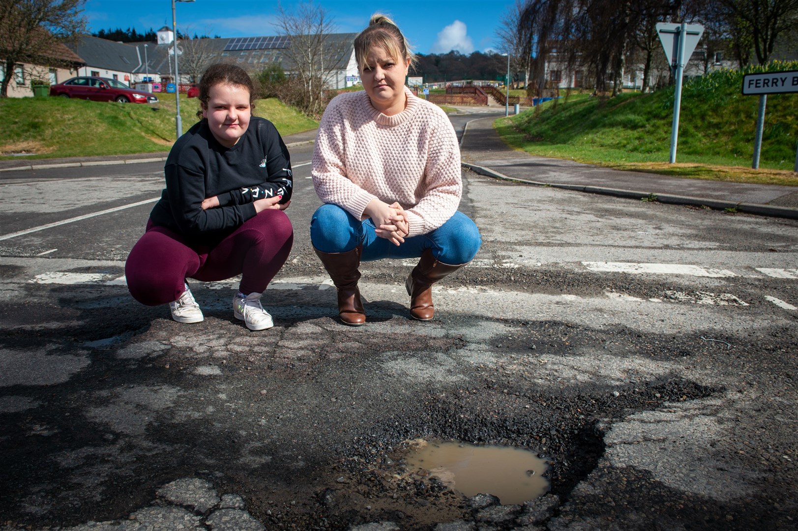 Lianne Cumming (right) with her daughter at the Ferry Brae junction. Picture: Callum Mackay.