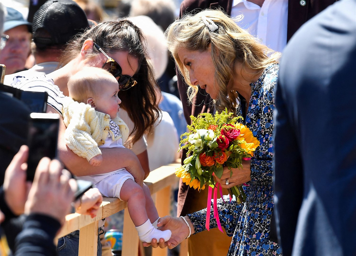 They also visited Bangor, where Sophie met a very young royal fan (Clodagh Kilcoyne/PA)