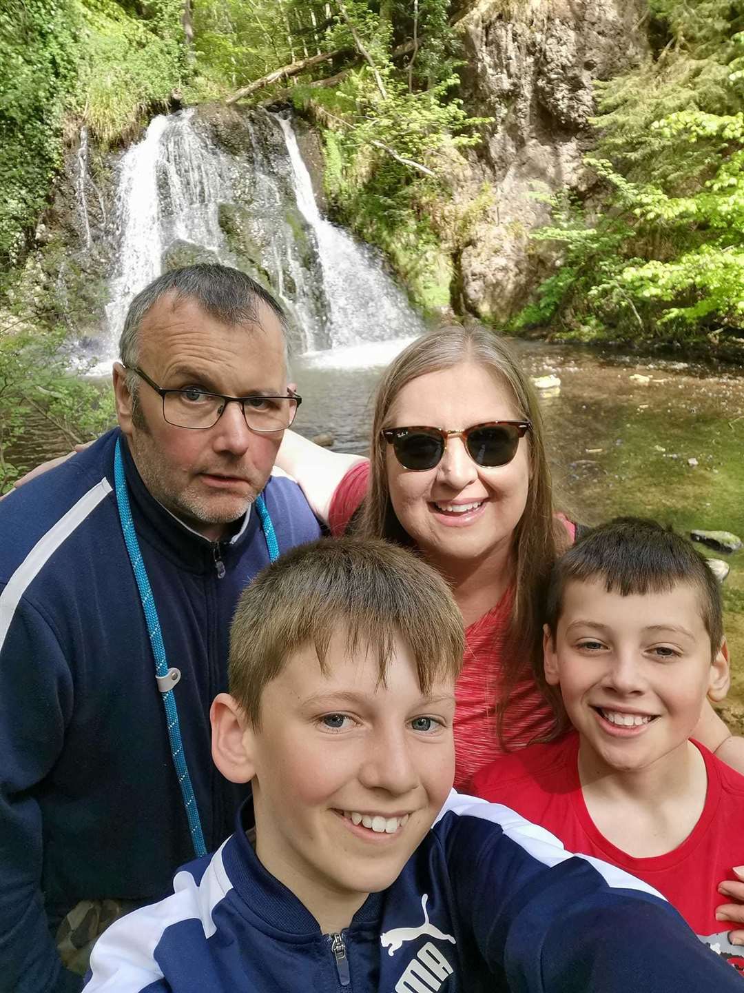 Gavin and Lindsay Brown with their sons Ben (12) and Lucas (9) at the Fairy Glan during one of their walks as part of their bit to walk 100 miles in May to raise funds for Melanoma UK.