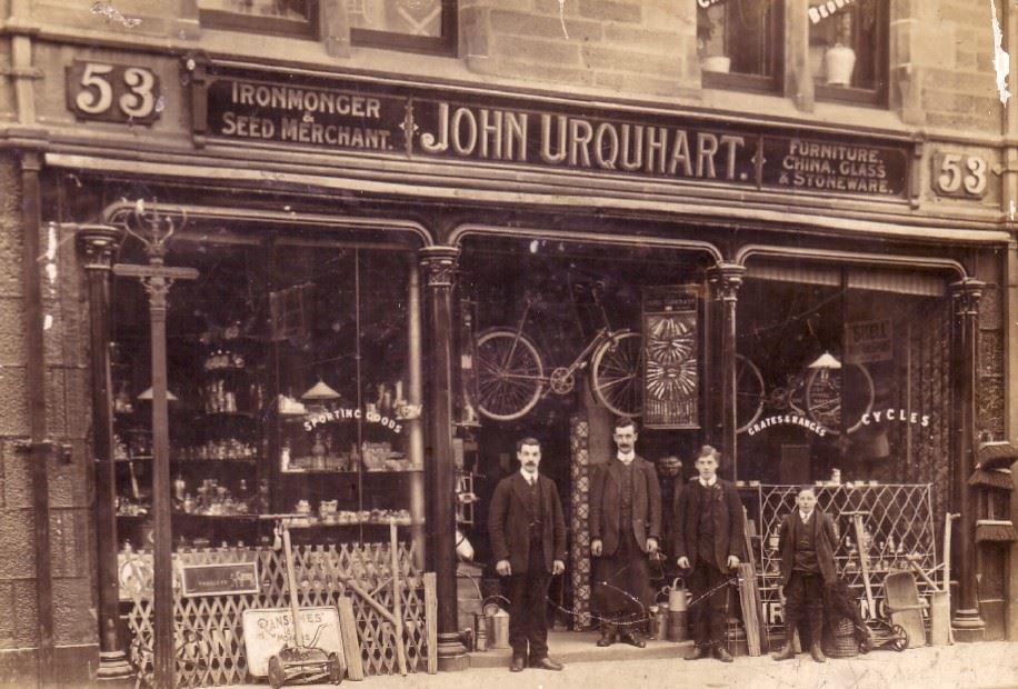 John Urquhart the Ironmongers circa 1920. Mr James Shanks is pictured on the left. Picture courtesy of Dingwall Museum Trust.