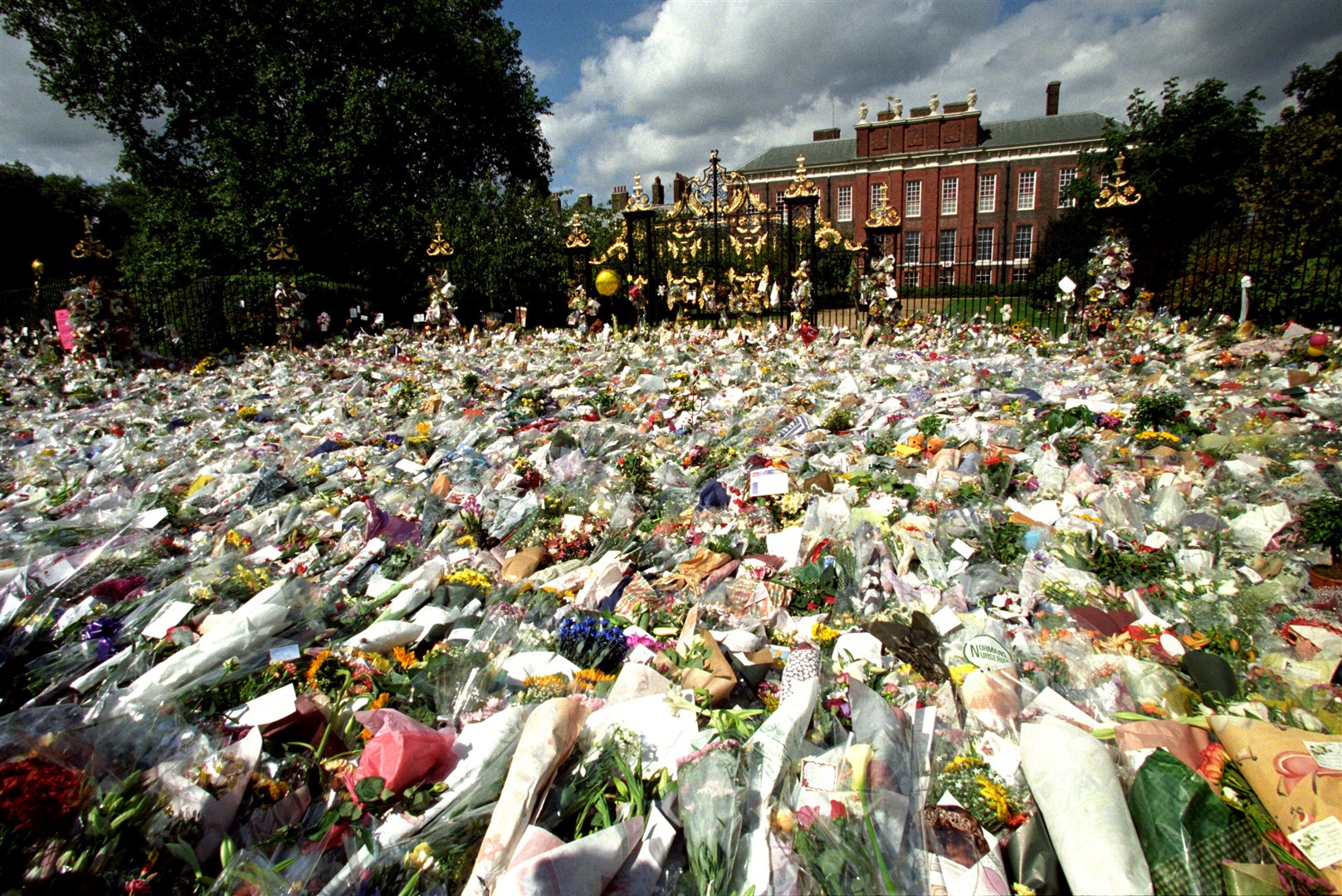 Flowers outside the gates of Kensington Palace for Diana in 1997 (David Giles/PA)