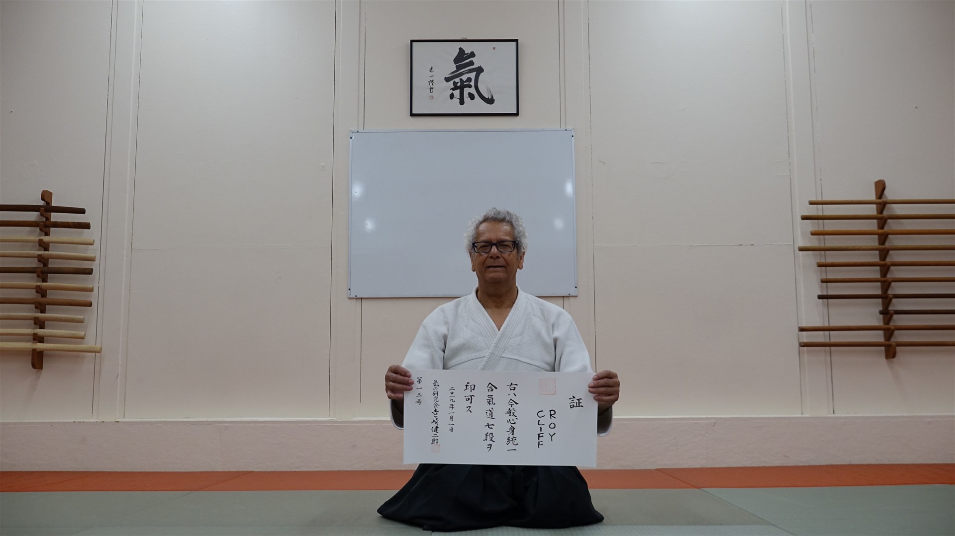 Roy Cliff is presented with his seventh dan in Aikido.