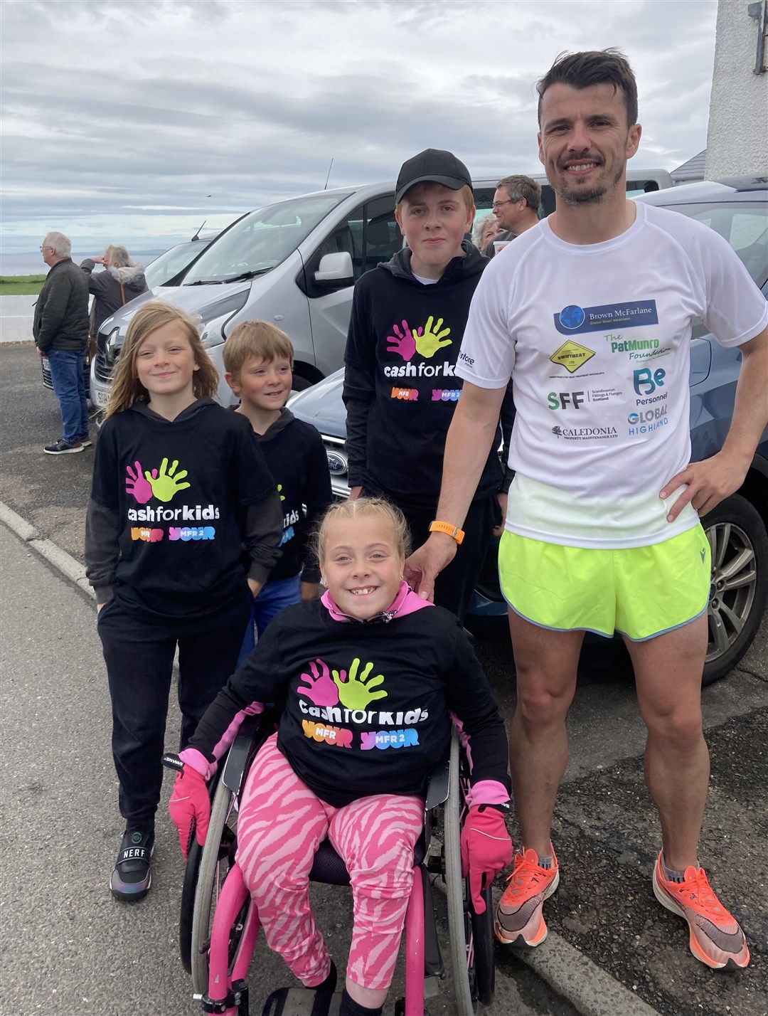Pebbles Sawyer and siblings meeting Steven Mackay at John O'Groats. Picture: MFR Cash for Kids