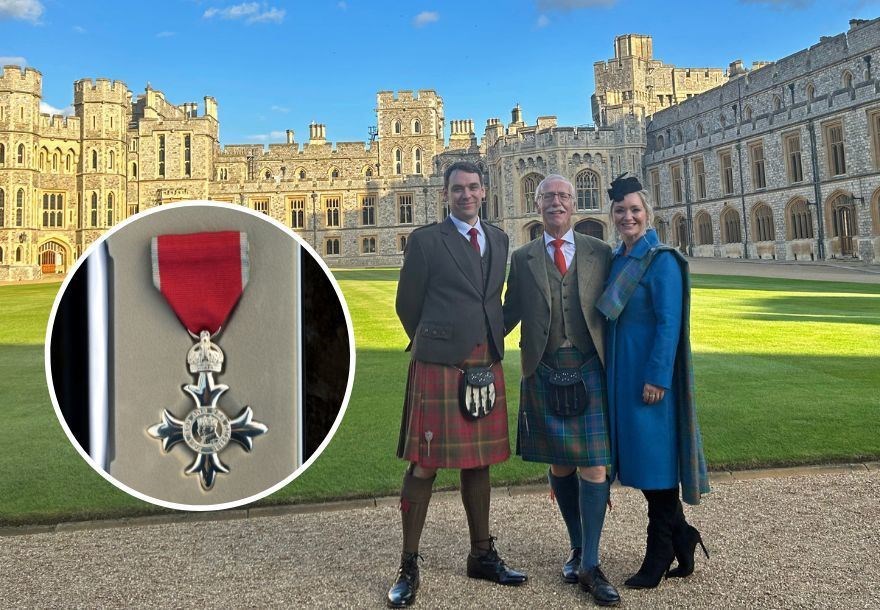 Malcolm Steven with his son, Robert Steven, and daughter, Rachel Barrington, at Windsor Castle where he was presented with the MBE by Princess Anne.
