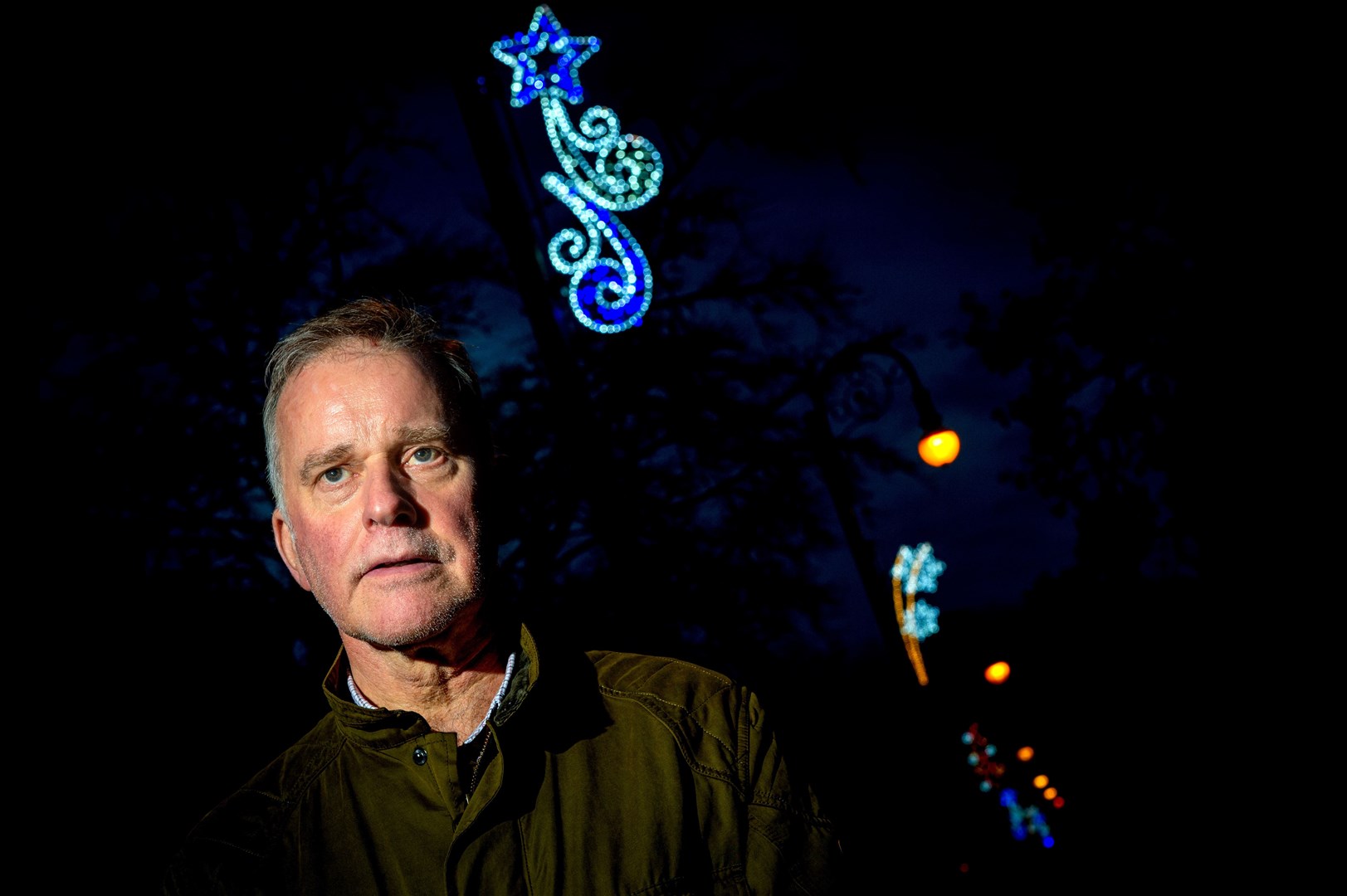 Ron McAulay with the Strathpeffer Christmas lights as a backdrop. Picture: Callum Mackay