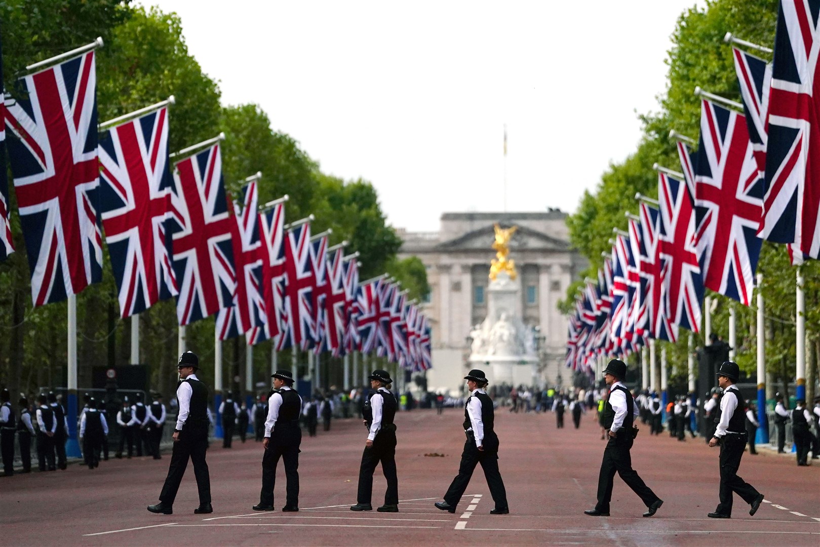 Police officers in The Mall, central London, ahead of the ceremonial procession of the coffin of the Queen from Buckingham Palace to Westminster Hall (Victoria Jones/PA)
