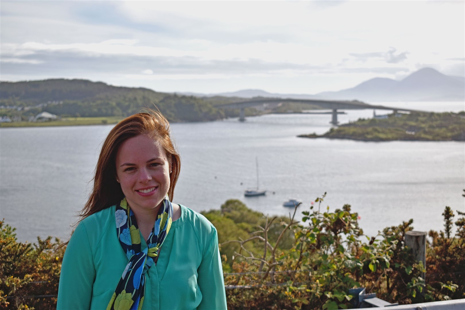 Kate Forbes with the Skye Bridge behind her.