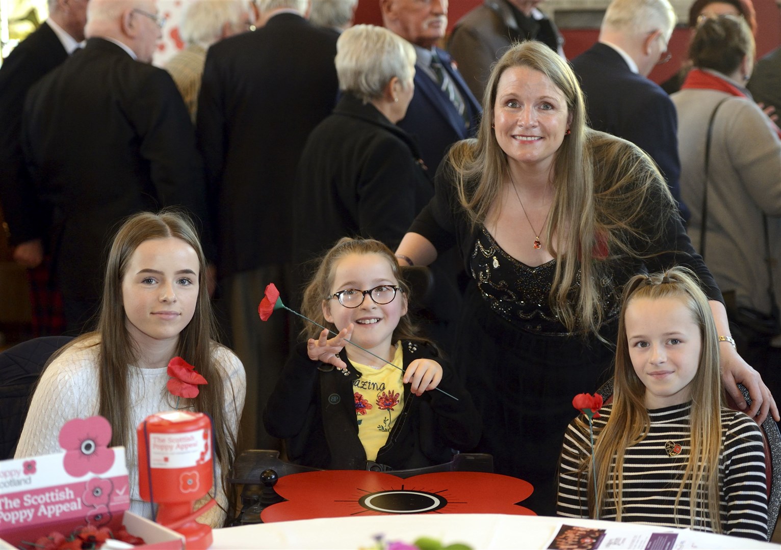 Poppy Scotland Reception 2019..Tracey Walsh of the Military Wives Choir with her three daughters, Ava, Sophia and Mya Walsh..Picture: James MacKenzie..