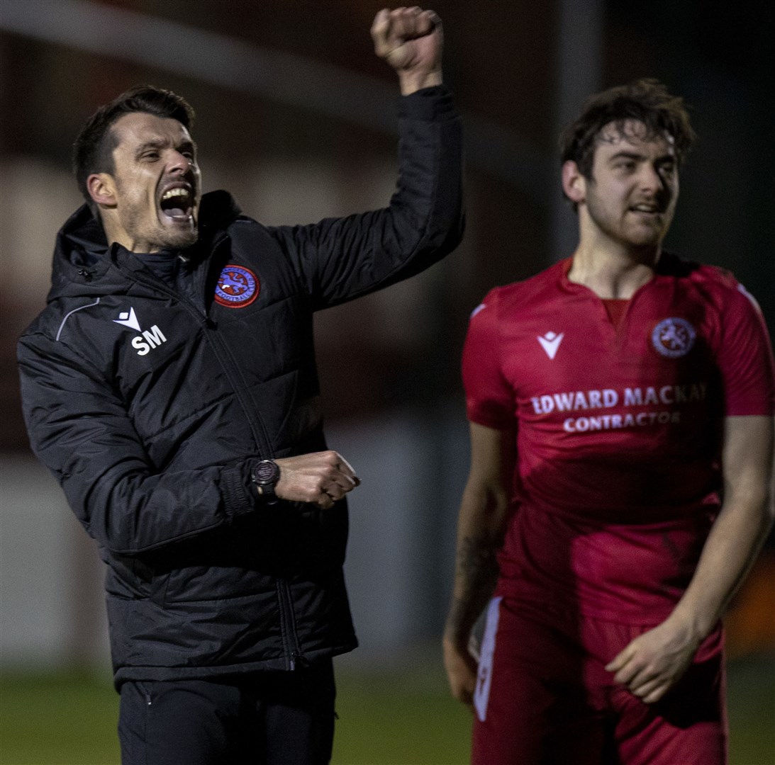Manager Steven Mackay (left) celebrates with striker Jordan MacRae after Tuesday night’s historic win. Picture: Ken Macpherson