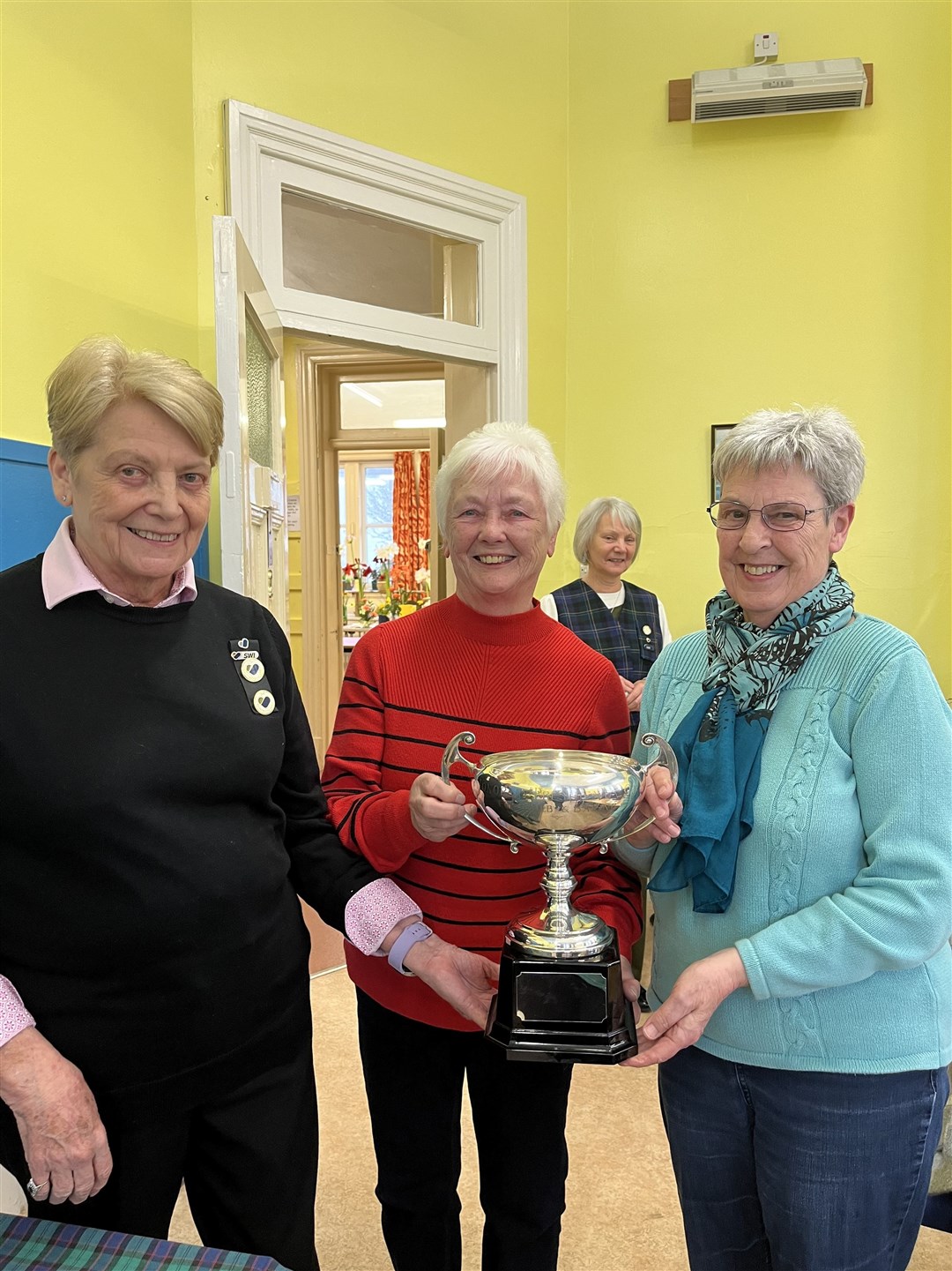 Rita Storr with Marjory Matheson,North Kessock & Edna MacBean Dingwall who were joint winners of the Honorary Secretary cup for most points in artificial flowers.