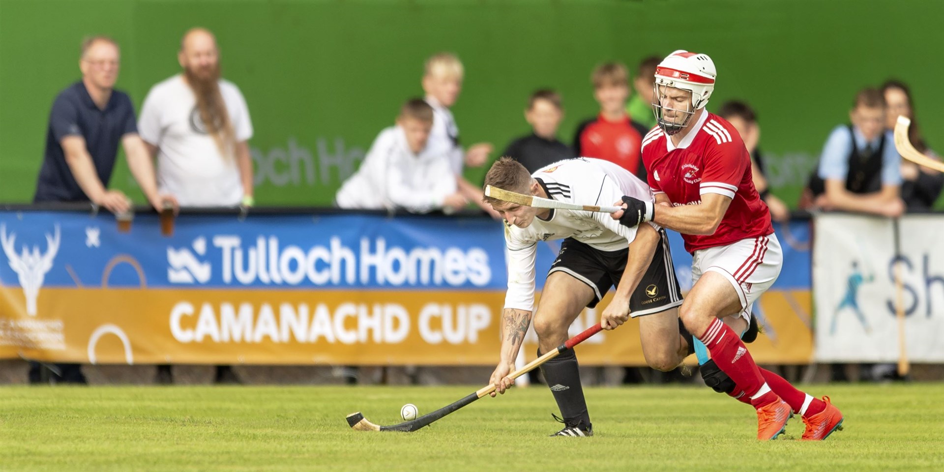 Finlay MacRae (right) in action in the Camanachd Cup final against Lovat in 2021. Picture: Neil Paterson
