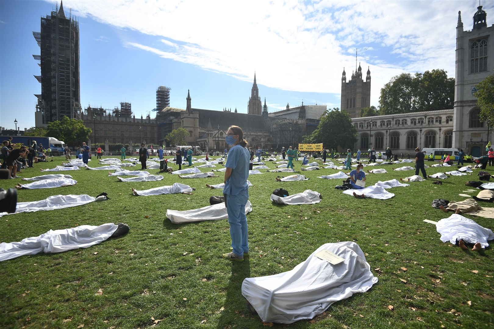 Extinction Rebellion protesters pose as corpses during a protest in Parliament Square (Victoria Jones/PA)