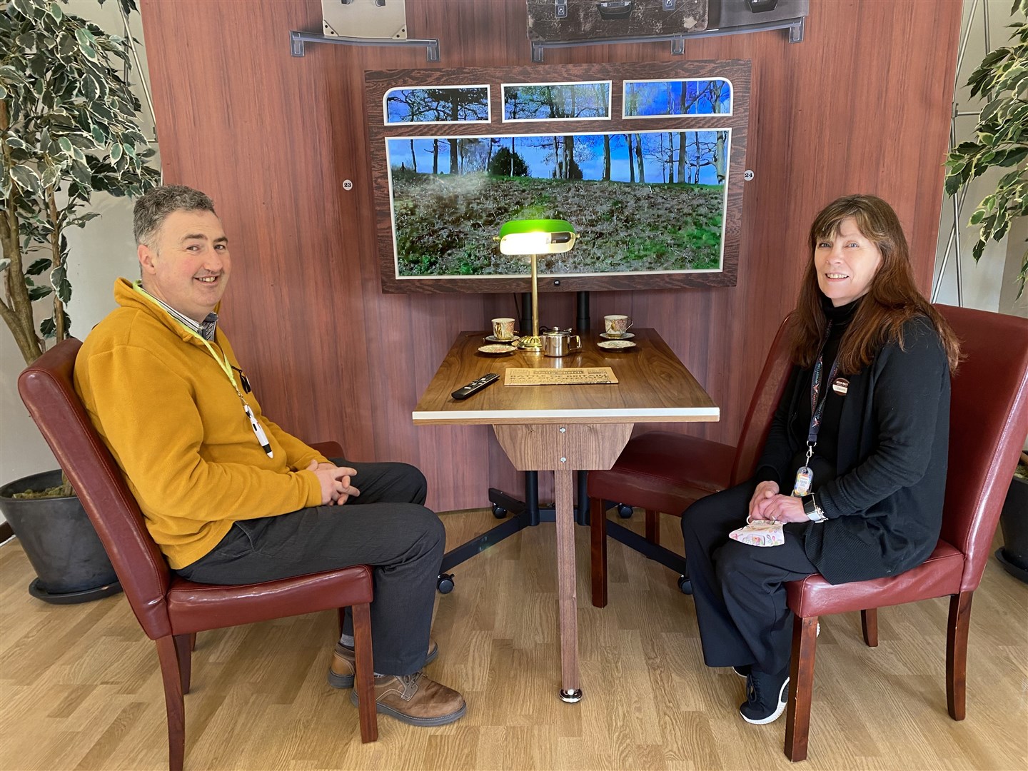 Manager Neil Souter and shop assistant Carolyn Thomson by the new dementia screen in the restaurant at James Pringle Weavers in Holm Mills Shopping Village in Inverness.