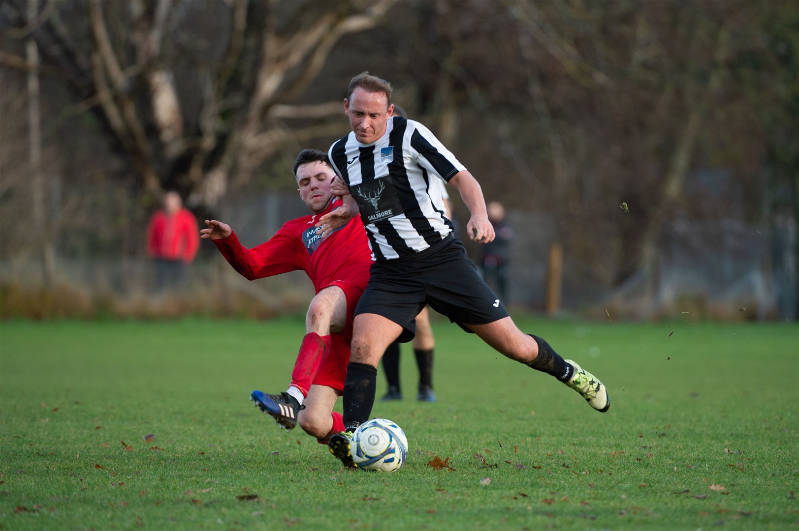 North Caledonian League Div 2..Alness v Inverness Athletic..Alness midfielder Gordon Finlayson and Athetic's Lewis Macleod...Picture: Callum Mackay..