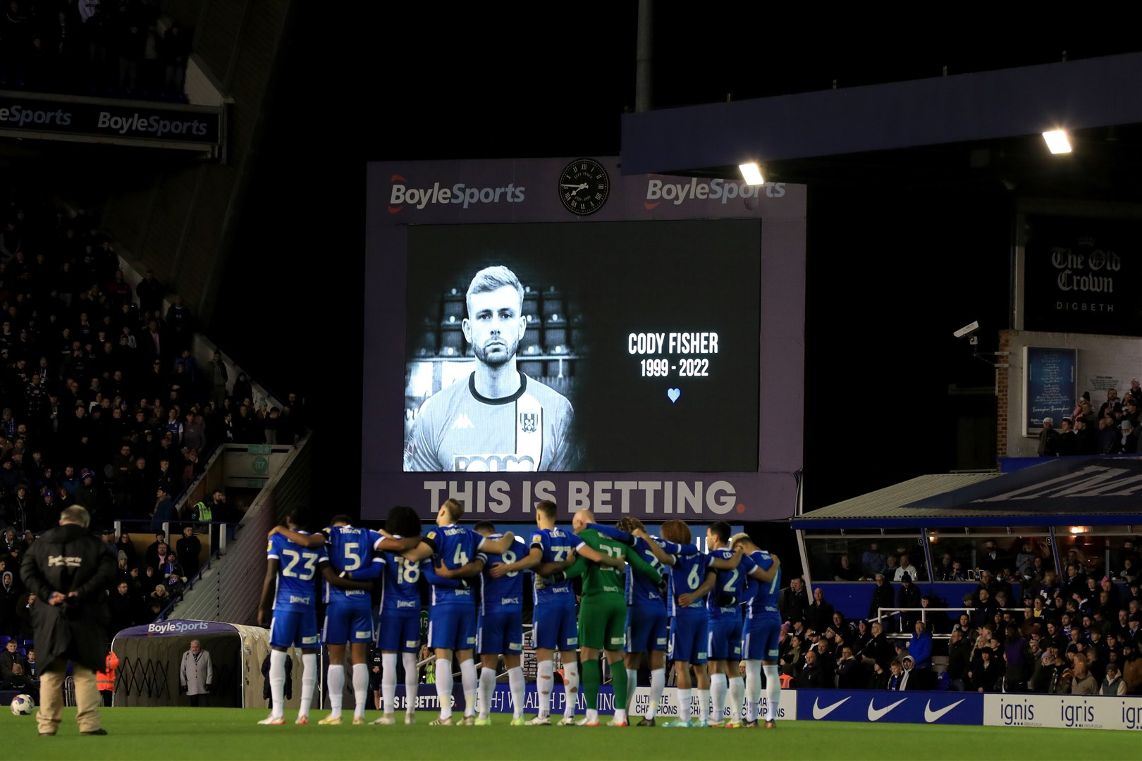 Players of both teams observe a minute’s silence for Cody Fisher ahead of the Sky Bet Championship match at St Andrew’s (Bradley Collyer/PA)