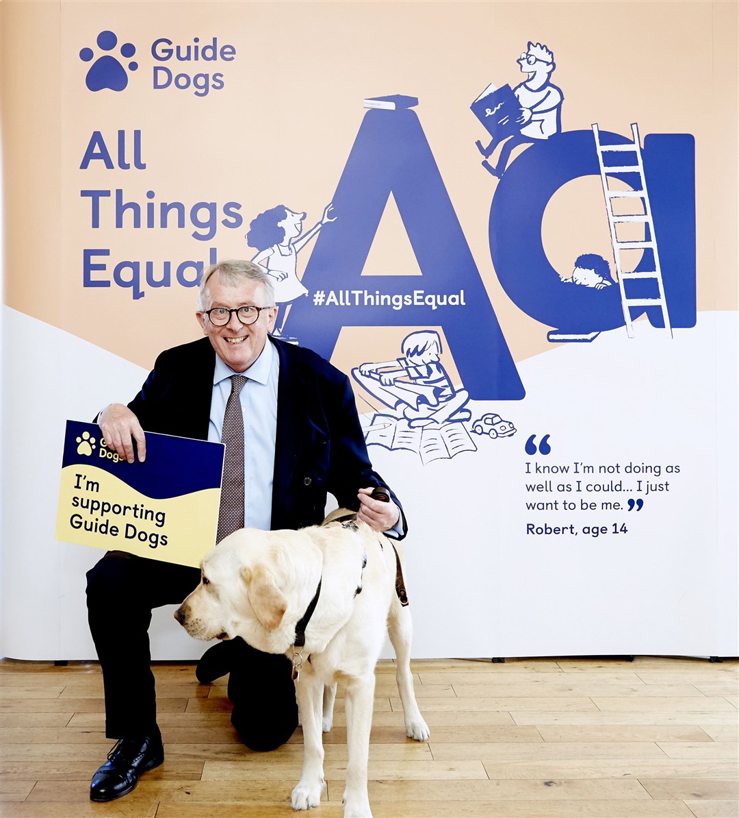 Mr Stone with a guide dog.