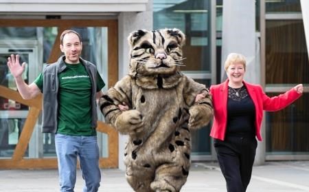 MSP Rhoda Grant joins Dr Roo Campbell of Scottish Wildcat Action and William the Wildcat to launch the group's new website