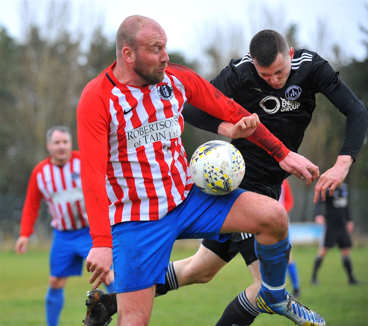 St Duthus's Ross Tokely wins a tussle with his Invergordon counterpart. Picture: Graeme Webster