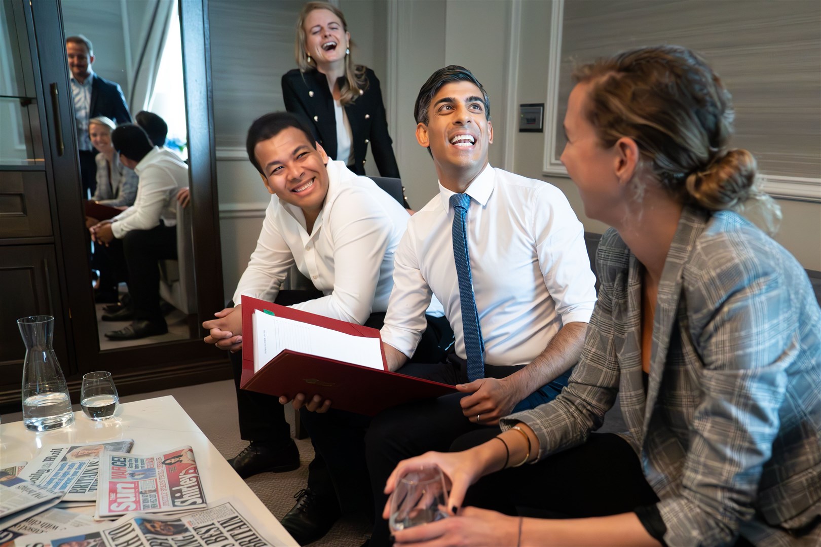 Prime Minister Rishi Sunak holds a meeting with his staff in his hotel room ahead of his keynote speech (Stefan Rousseau/PA)