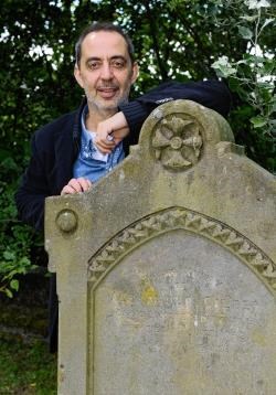 Rosario’s cultural secretary, Fabian Omark Barzan, pays his respects at the grave in Dingwall of the father of their founder. Picture: Andrew Smith SPP.