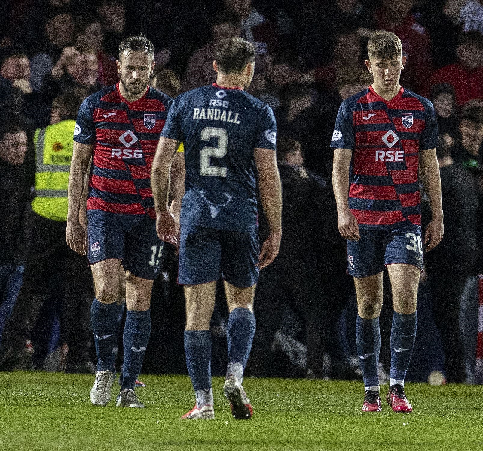 Dylan Smith (right) was shown a red card early on against Partick Thistle. Picture: Ken Macpherson