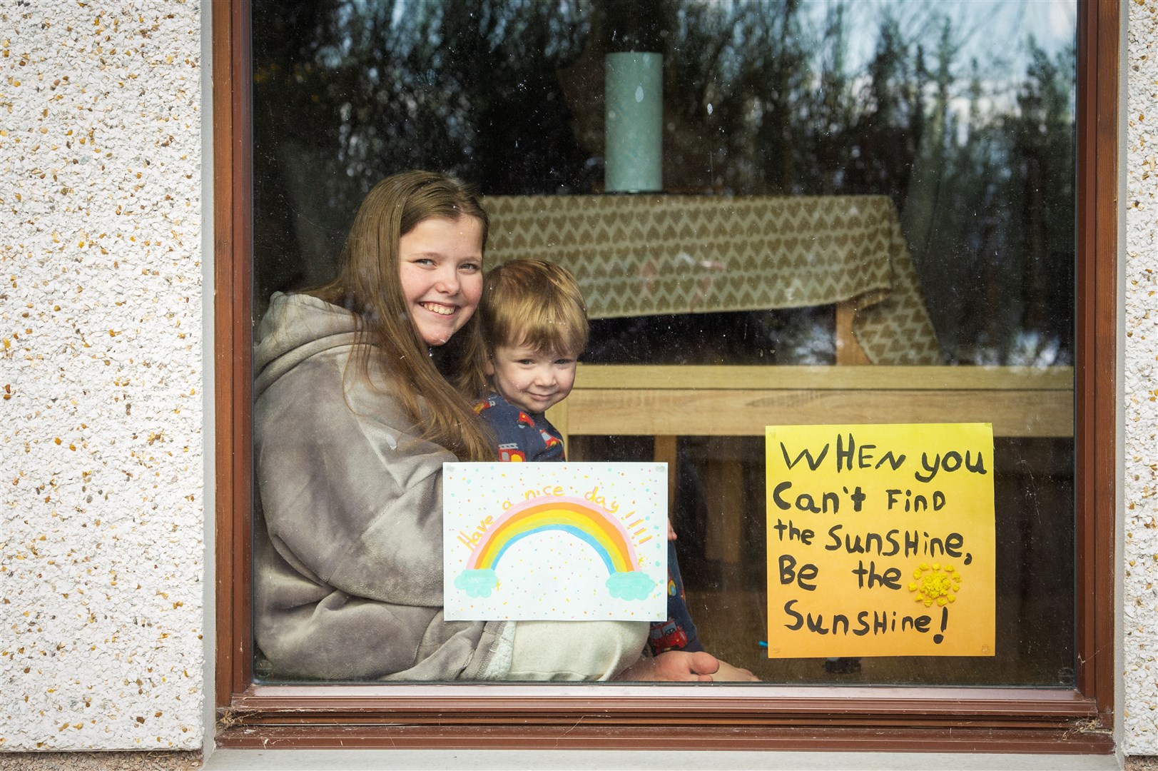 Jessica and George Fraser from Alness offer an uplifting message. Picture: Callum Mackay.
