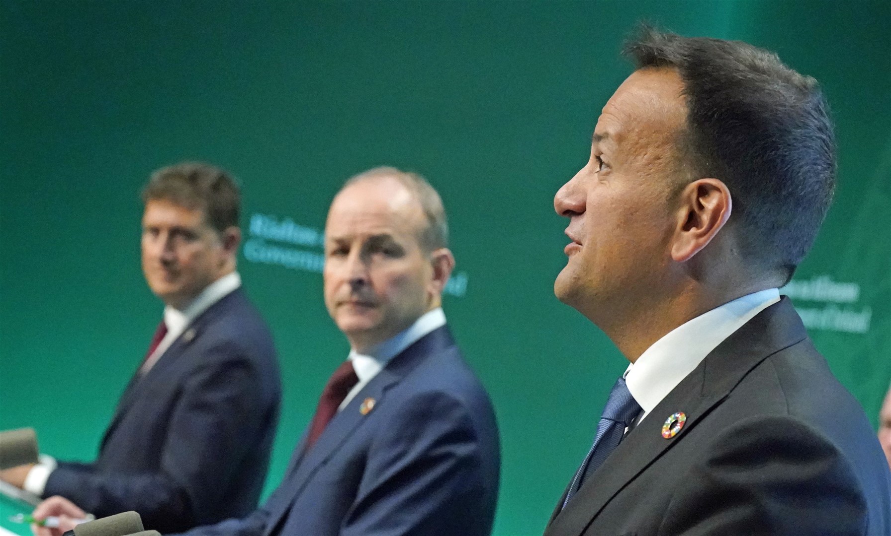 (left to right) Transport Minister Eamon Ryan, Taoiseach Micheal Martin and Tanaiste Leo Varadkar (Niall Carson/PA)